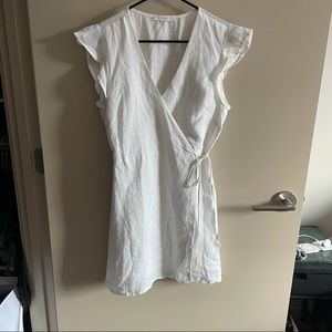 Olivaceous white linen cap sleeve wrap dress